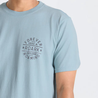 Roark Stamp Premium Tee in Dusty Blue with back graphic and premium fit.