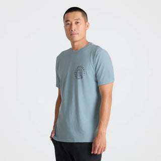 Roark Stamp Premium Tee in Dusty Blue with back graphic and premium fit.