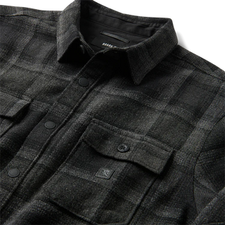 Roark Nordsman Long Sleeve Flannel in Black Heather with wool blend fabric and snap-front closure.