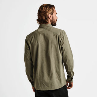 Roark Bless Up Long Sleeve Shirt, Light Army, moisture-wicking, breathable, snap buttons, dual pockets, 96% polyester, 4% spandex.