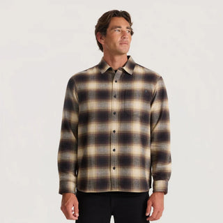 Roark Crossroads Organic Cotton Flannel in Faded Brown with a brown, cream, and grey plaid pattern, button-front closure, chest pocket, and long sleeves