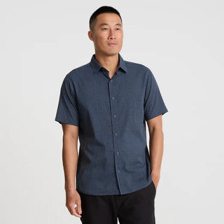 Roark Bless Up Shirt in Navy with breathable perforated stretch fabric and moisture-wicking Tactel nylon construction.