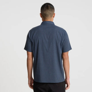 Roark Bless Up Shirt in Navy with breathable perforated stretch fabric and moisture-wicking Tactel nylon construction.