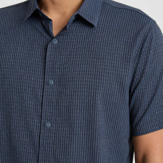 Roark Bless Up Shirt in Navy with breathable perforated stretch fabric and moisture-wicking Tactel nylon construction.