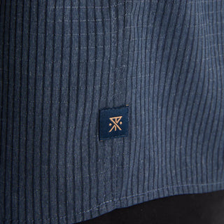 Roark Bless Up Shirt in Navy with breathable perforated stretch fabric and moisture-wicking Tactel nylon construction.