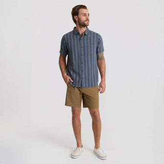 Roark Crosswinds Button Up Shirt in Neptune with blue-grey vertical dobby stripes, short sleeves, a button-front closure, and chest pocket