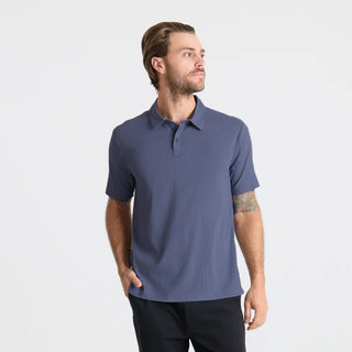 Roark Bless Up Polo Shirt Slate with breathable stretch Tactel fabric, moisture-wicking design, lightweight comfort, and technical performance style.