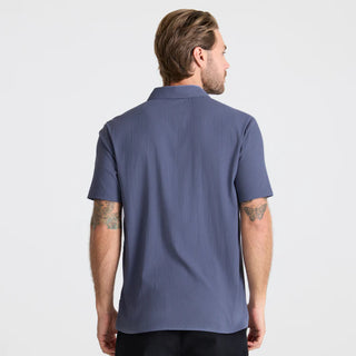 Roark Bless Up Polo Shirt Slate with breathable stretch Tactel fabric, moisture-wicking design, lightweight comfort, and technical performance style.
