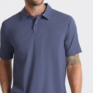 Roark Bless Up Polo Shirt Slate with breathable stretch Tactel fabric, moisture-wicking design, lightweight comfort, and technical performance style.
