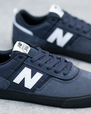 New Balance Numeric Jamie Foy 306 Shoes in Eclipse/White - low-profile vulcanized skate shoe with lightweight suede, breathable mesh panels, and visible rubber layer