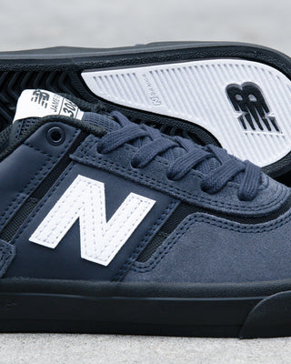 New Balance Numeric Jamie Foy 306 Shoes in Eclipse/White - low-profile vulcanized skate shoe with lightweight suede, breathable mesh panels, and visible rubber layer