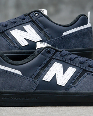 New Balance Numeric Jamie Foy 306 Shoes in Eclipse/White - low-profile vulcanized skate shoe with lightweight suede, breathable mesh panels, and visible rubber layer