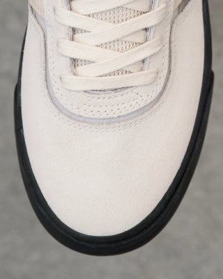 New Balance Numeric Jamie Foy 306 skate shoes in White and Blue with durable suede and mesh upper, rubber underlays, vulcanized outsole, elastic gusseted tongue, and hidden toe protection