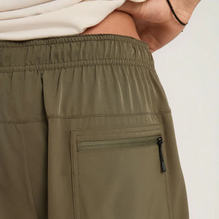 Roark Serrano 7 inch Active Stretch Shorts in Military, athletic fit lightweight REPREVE recycled polyester shorts with DWR water-resistant finish, side zip pocket, dual slash pockets, and rear YKK zip pocket