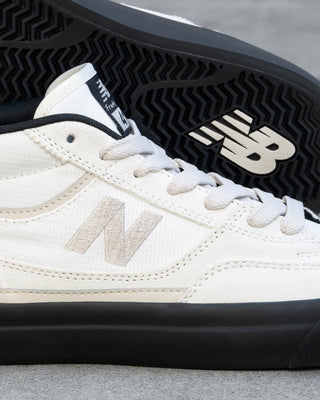 New Balance Numeric Franky Villani 417 skate shoe in sea salt and black, suede canvas upper, mid cut, vulcanized sole.