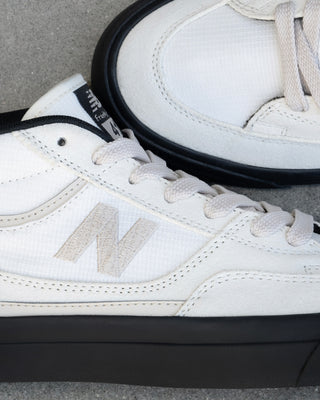New Balance Numeric Franky Villani 417 skate shoe in sea salt and black, suede canvas upper, mid cut, vulcanized sole.