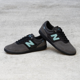 New Balance Numeric 508 Brandon Westgate skate shoe in dark grey and teal with suede toe, mesh collar, reflective details.