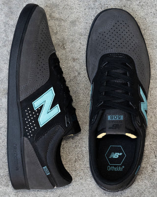 New Balance Numeric 508 Brandon Westgate skate shoe in dark grey and teal with suede toe, mesh collar, reflective details.