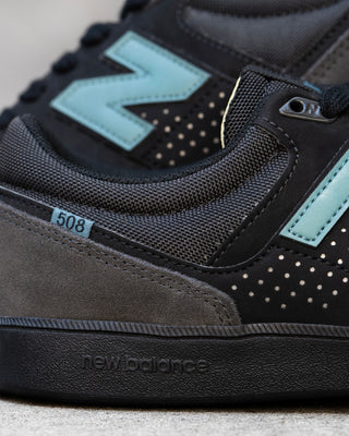 New Balance Numeric 508 Brandon Westgate skate shoe in dark grey and teal with suede toe, mesh collar, reflective details.