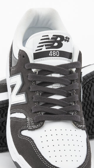New Balance Numeric 480 in Black Cement/White with suede mesh upper, FuelCell foam, and reinforced toe cap.