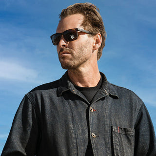 Electric Satellite sunglasses in Matte Torte Jr with bronze polarized lenses and bio-resin frame.