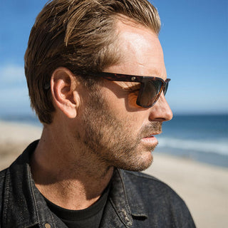 Electric Satellite sunglasses in Matte Torte Jr with bronze polarized lenses and bio-resin frame.