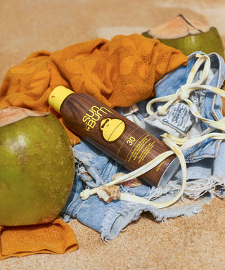 Sun Bum SPF 30 sunscreen spray, natural compression, Vitamin E enriched, broad spectrum protection.