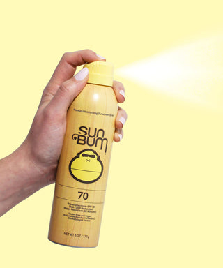 Image of Sun Bum Original SPF 70 Sunscreen Spray, a high-protection, vegan, and reef-safe sunscreen, infused with Vitamin E and offering 80 minutes of water resistance.