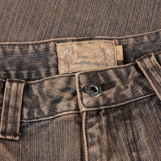 Brown Dime denim shorts with embroidered logo, classic fit, and wavy back pockets
