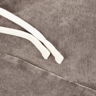 White plastic straps on a textured gray surface