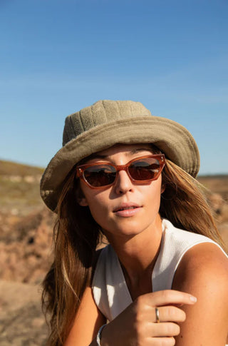 Otis Eyewear Selena sunglasses in Eco Ochre Havana with Brown mineral glass lenses, bold angular handmade eco acetate frame with Viscottica hinges, stainless steel screws, Category 3 100% UVA UVB protection, 4 base lens curve, 54-18-145mm sizing, fits most face shapes
