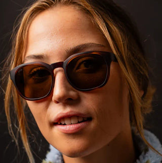 Otis Eyewear Offset Sport sunglasses in Matte Amberwood Tort with Brown Polar mineral glass lenses, Italian-made Eco-Grilamid ultra-lightweight frame with increased pantoscopic tilt, subtle side blinders, integrated nose pads and temple tips, hand-painted finish