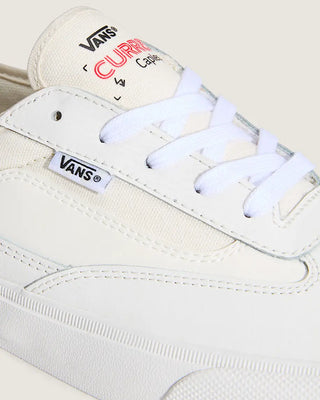 White Vans sneaker with visible branding on a light background