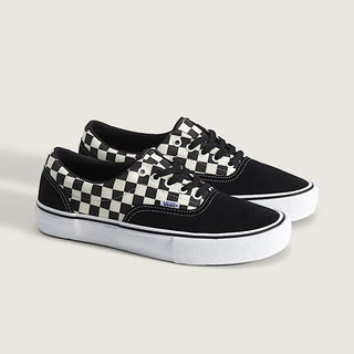 Vans Skate Era shoes with black and white checkerboard canvas, suede overlays, padded collar, and white waffle sole.
