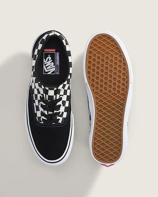 Vans Skate Era shoes with black and white checkerboard canvas, suede overlays, padded collar, and white waffle sole.