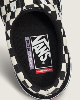 Vans Skate Era shoes with black and white checkerboard canvas, suede overlays, padded collar, and white waffle sole.