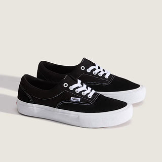 Vans Skate Era Skate Shoes in Black/White — suede and canvas upper with vulcanized waffle outsole, PopCush™ footbeds, DuraCap™ reinforcement, and SickStick™ grip. The original skate shoe reengineered.

