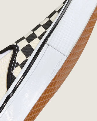 Vans Skate Slip-On Checkerboard Shoe in Black/Off White, enhanced with DURACAP, SickStick grip, and PopCush cushioning.