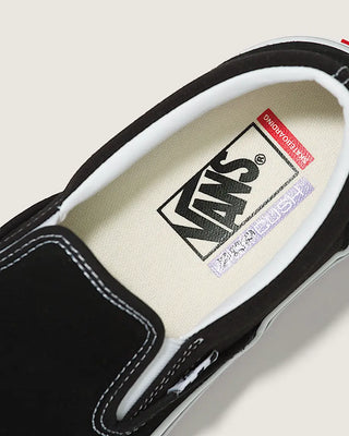 Close-up of a Vans shoe with the brand logo on the insole.