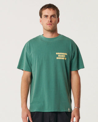 Critical Slide Sabbatical Tee in Dusty Green with artist collaboration print and garment-dyed soft cotton finish.