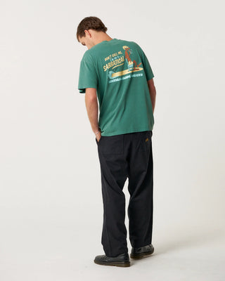 Critical Slide Sabbatical Tee in Dusty Green with artist collaboration print and garment-dyed soft cotton finish.