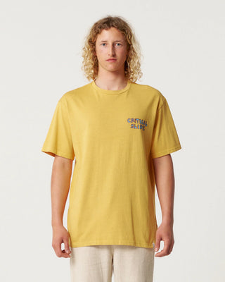 Critical Slide Society Logger Tee in Mustard with vintage wash and original artwork.