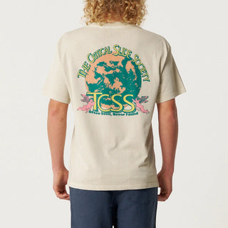 Person wearing a beige t-shirt with a colorful graphic on the back, standing against a plain background.