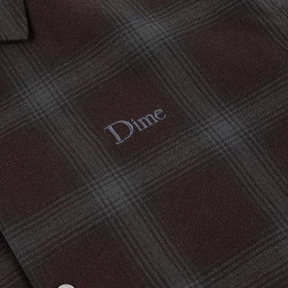 Front view of Dime Premium Flannel Shirt in Bordeaux with dark plaid, a button front, pointed collar, and embroidered Dime logo at the left chest