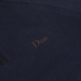 Navy blue fabric with 'Dime' logo in brown