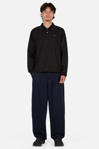 Dime Jacquard Long Sleeve Polo in Black — 100% polyester with pearl button placket, ribbed striped collar, ribbed cuffs, set-in sleeves, and embroidered Dime logo at left chest