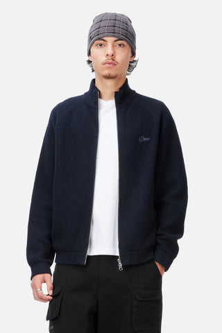 Front view of Dime Knitted Pique Zip Sweater in Dark Navy with a two-way silver zipper, raglan sleeves, and subtle left-chest logo