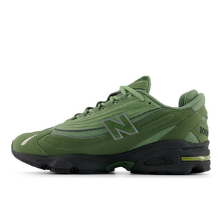 New Balance 1000 sneakers in Utility Green and Oregano colorway with inverted mesh underlays and suede overlays