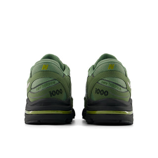 New Balance 1000 sneakers in Utility Green and Oregano colorway with inverted mesh underlays and suede overlays