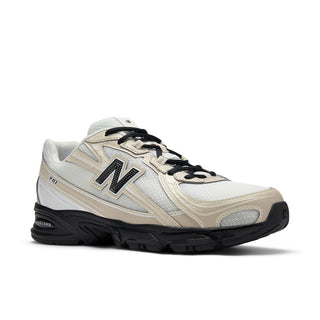 New Balance 740 sneakers in Timberwolf and White colorway with mesh and leather-look construction and ABZORB technology